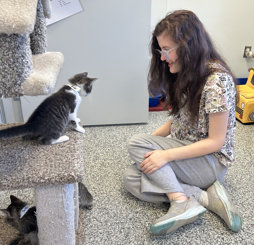 student with cat