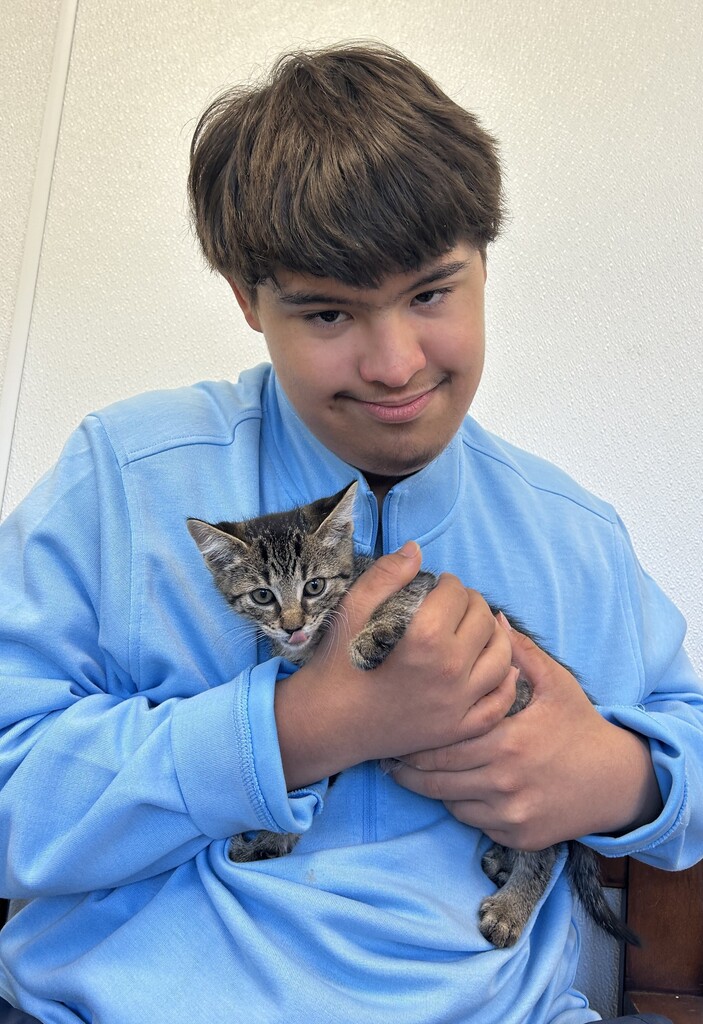 student with cat