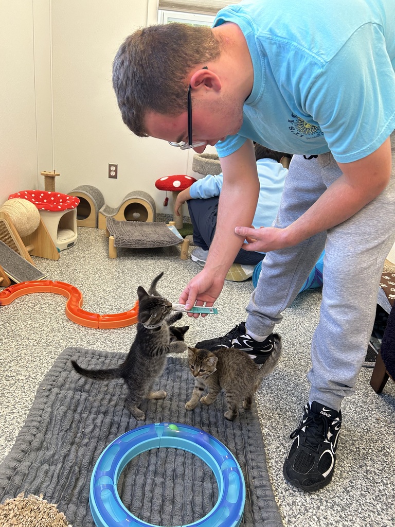 student with cat