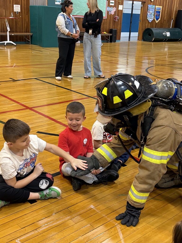 students with firefighters