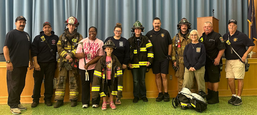 students with firefighters