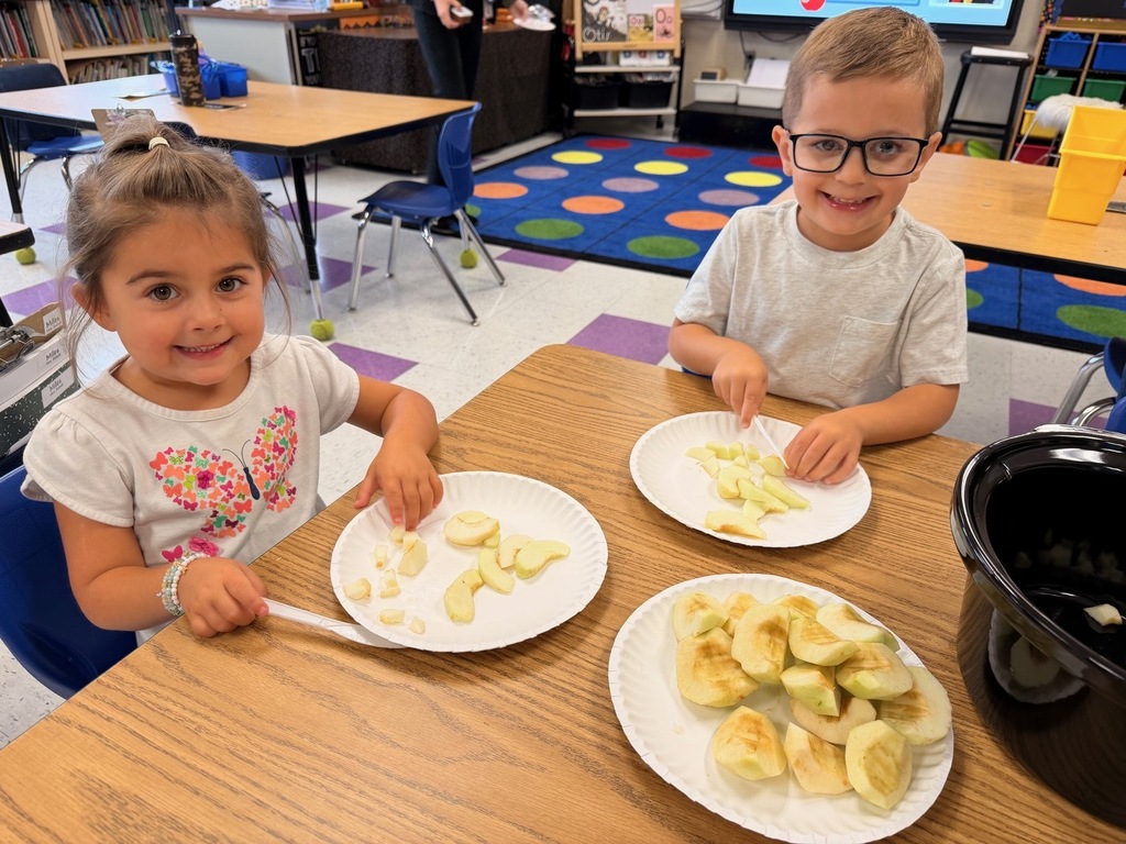 students with apples