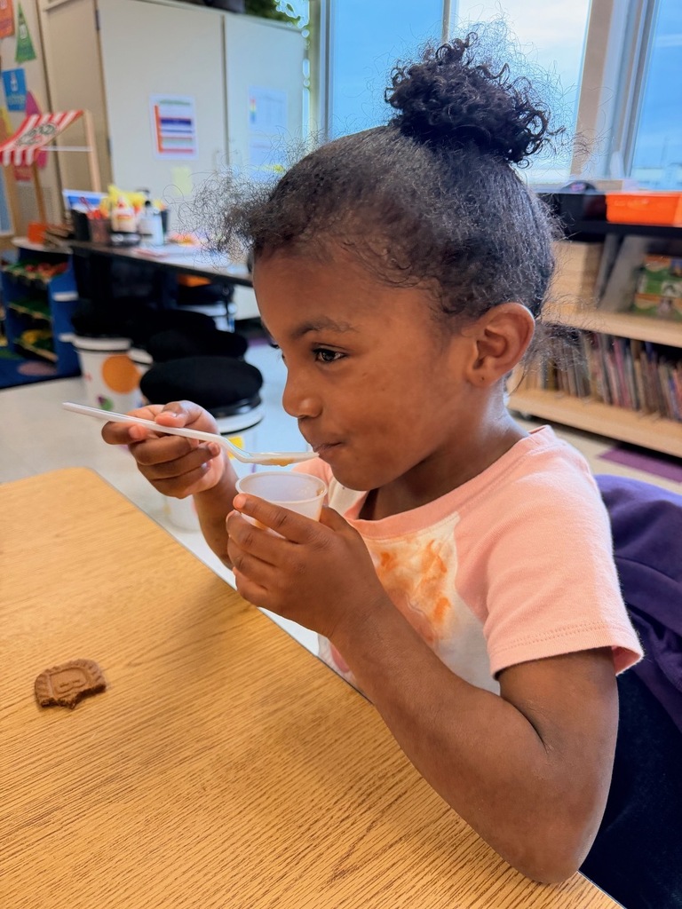 student with apple sauce
