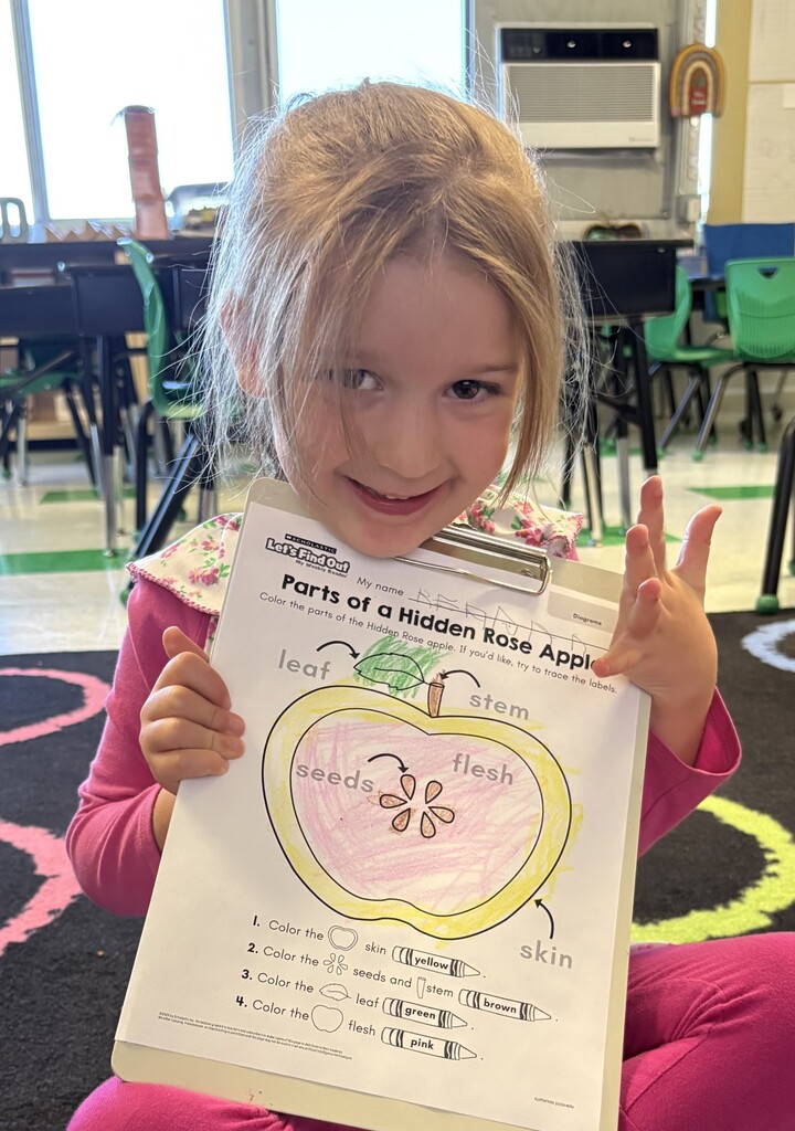 student with apple