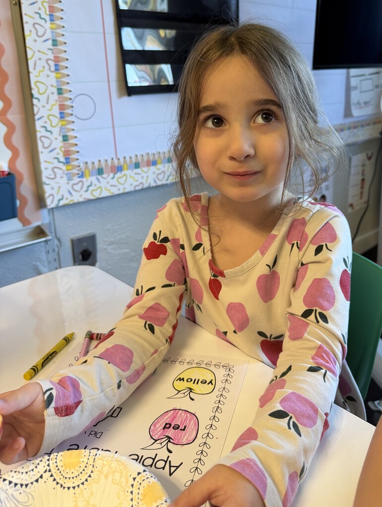 student with apple