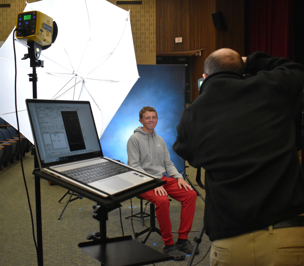 student having photo taken
