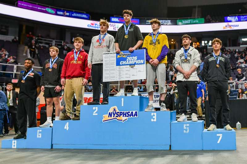 wrestlers on podium