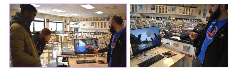 students looking at videos of CubeSat