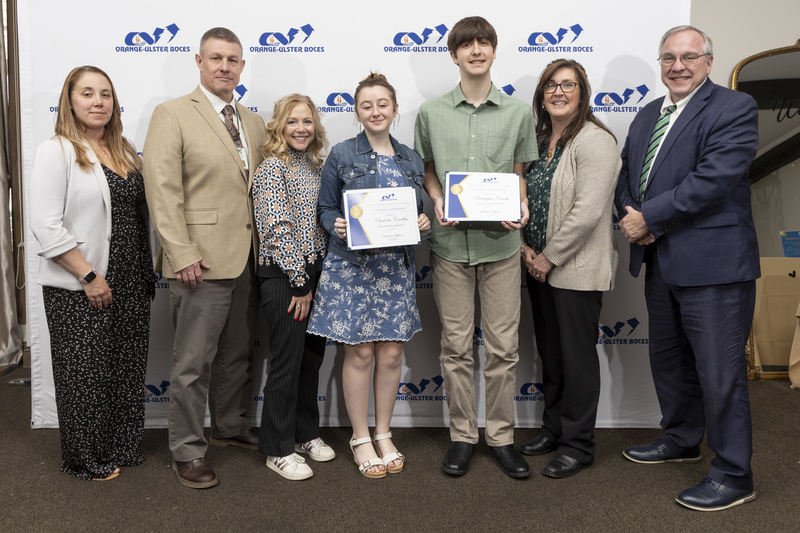 Honorees with family and administrators