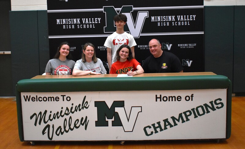 student athlete and family