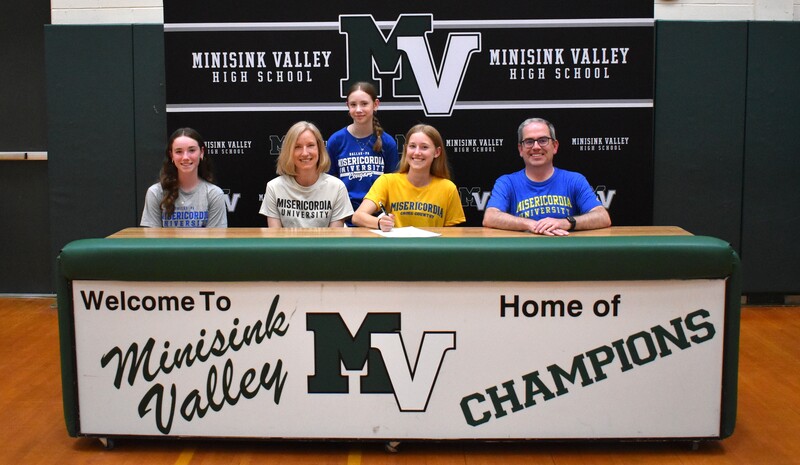 student athlete and family