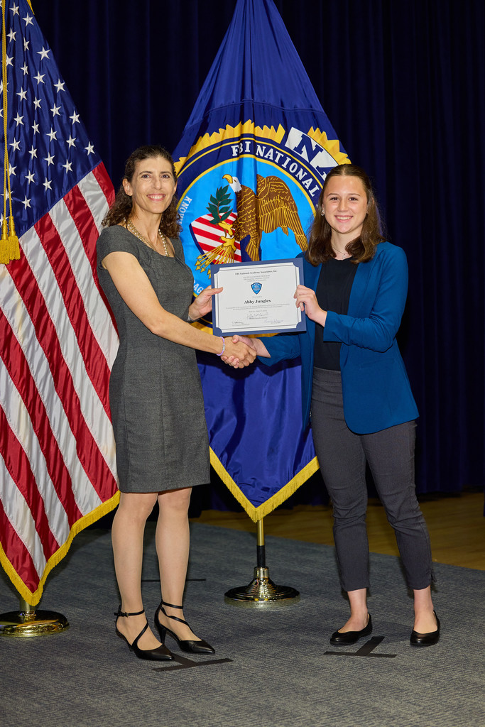 student with certificate