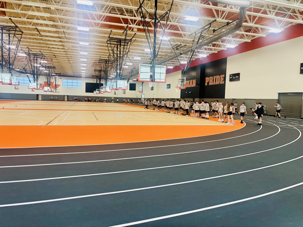 students in fieldhouse