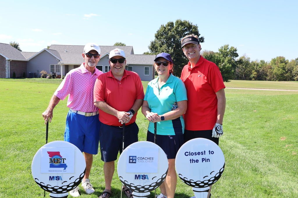 Golfers posing