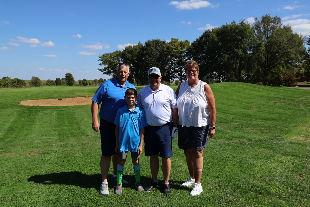 Golfers posing