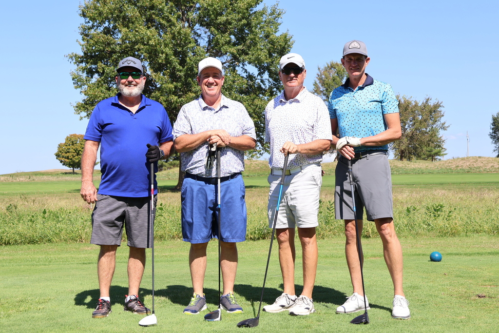 Golfers posing