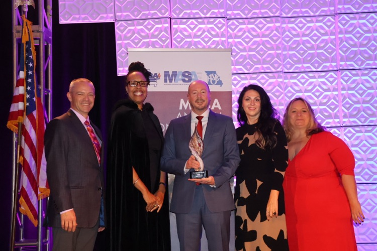 Dr Bracht with board and wife