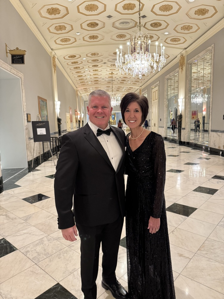 Dr. Schmitz and wife dresses to the nines in the hotel 