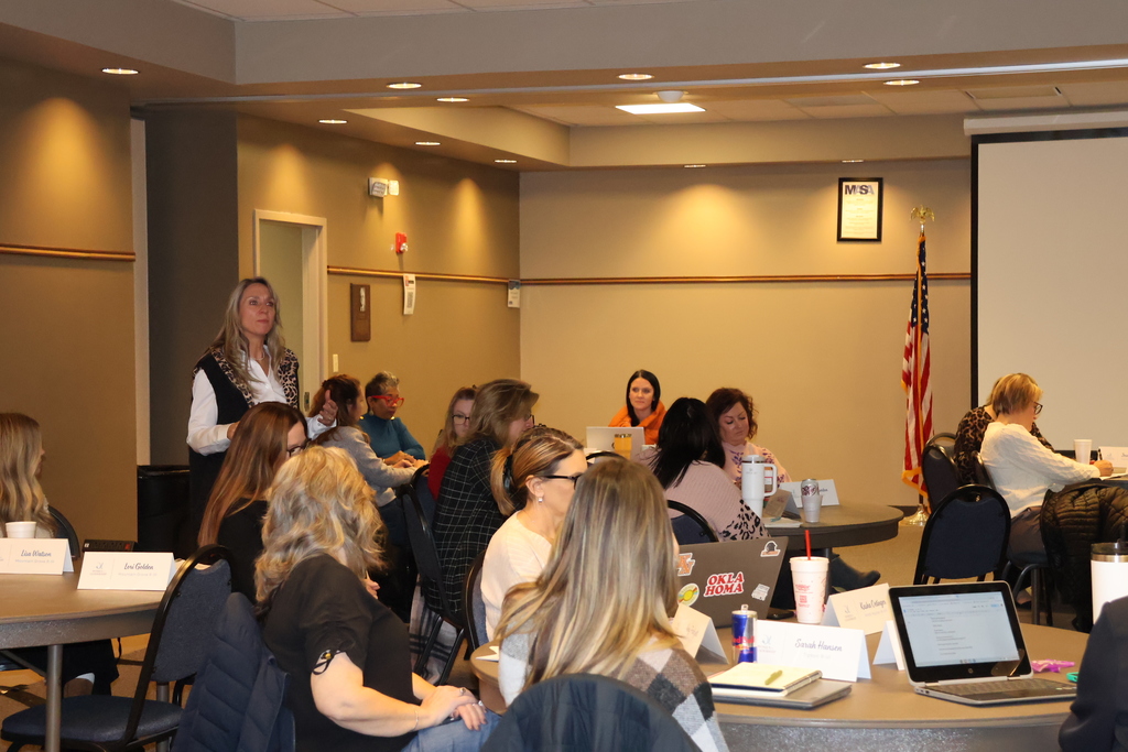 Dr. Jamie Burkhart speaking to the group