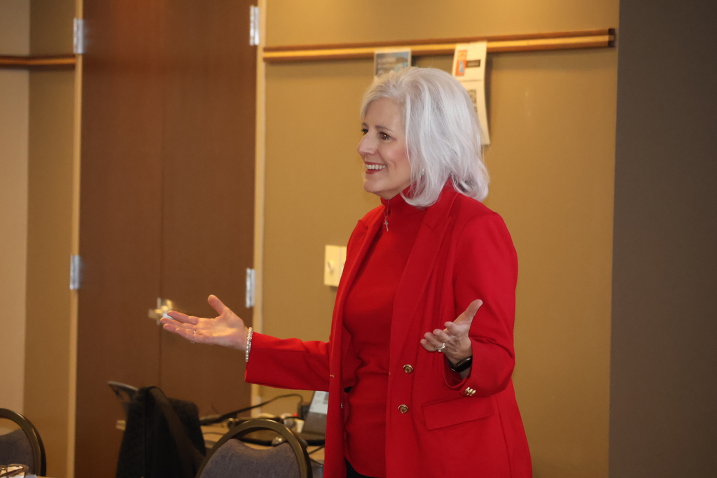 Dr. Ashby speaks in front of the room.