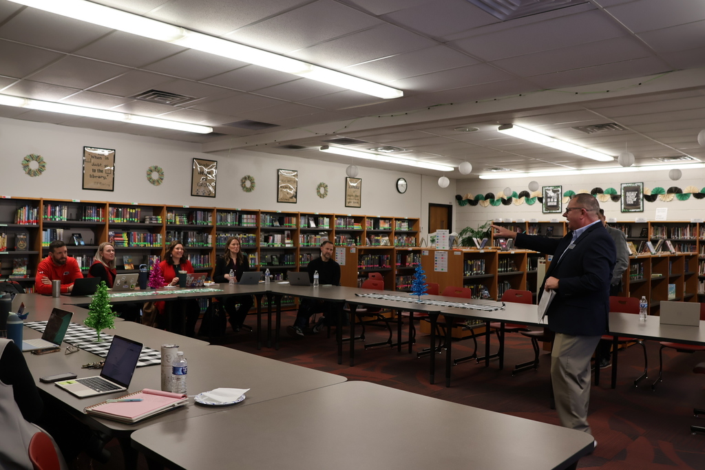 Dr. Penny addresses admin team. 