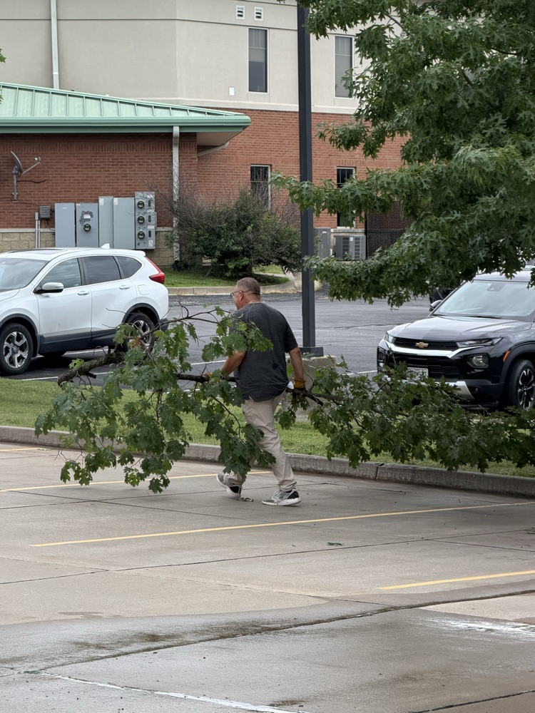 MASA team cleaning the grounds