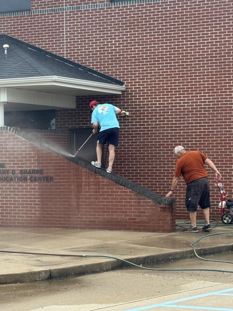 MASA team cleaning the grounds