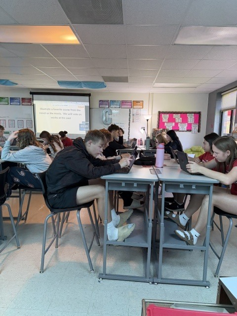 Students working at tables.