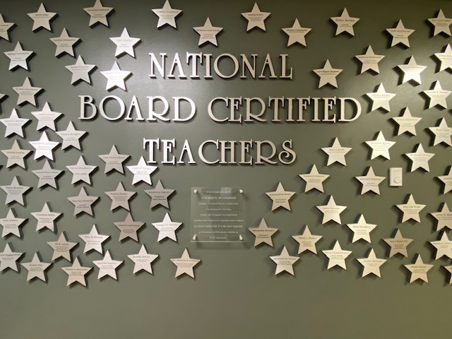 An wall with stars and the words "National Board Certified Teachers"