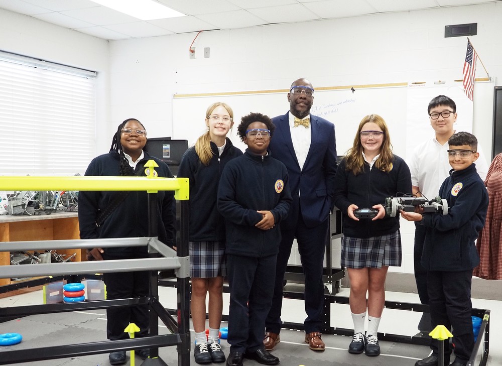 Chresal D. Threadgill with Robotics students