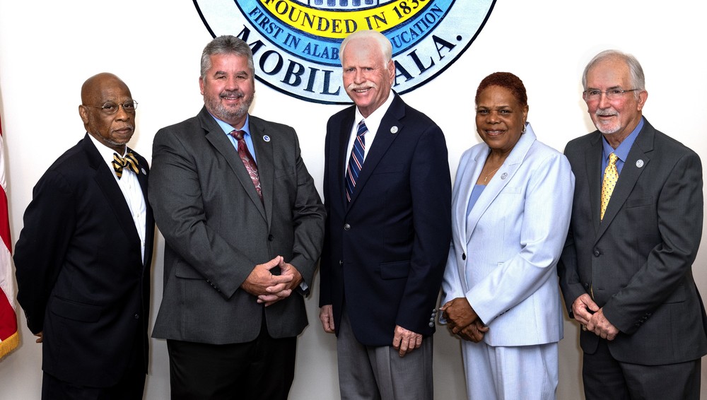 The five members of the Mobile County Board of School Commissioners