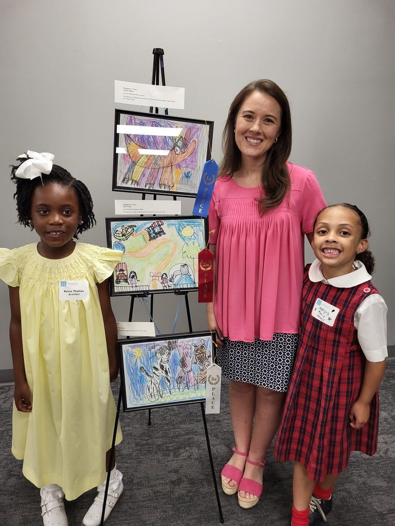 Students during dreamARCHITECTURE reception with their artwork on display