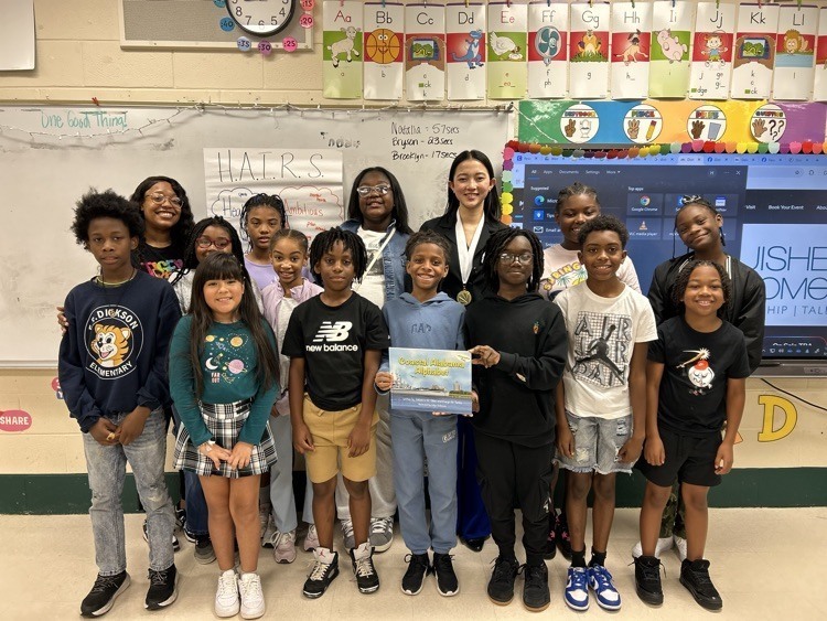 Distinguished Young Woman 2024 winner Alicia Chu poses with E.R. Dickson Elementary students