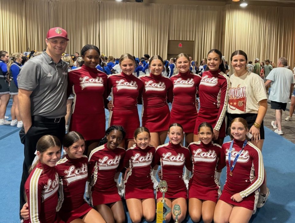 A group photo of the Lott Middle School cheerleaders, in uniform