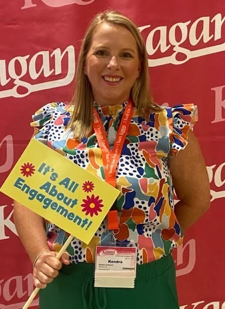 Hankins assistant principal Kendra Isenhower, holding a sign that reads: It's all about engagement!