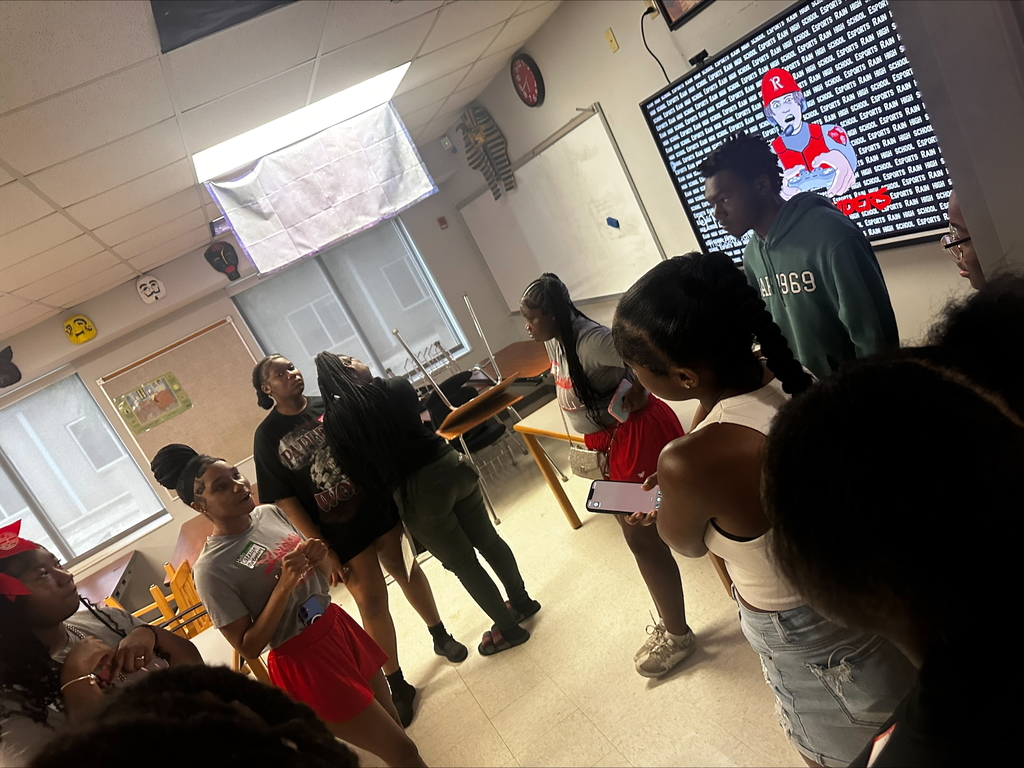 Students during campus tour with cheerleaders.