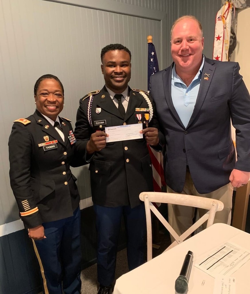 Cdt SGM Evan Eleekima stands with MCPSS Director of Army Instruction LTC Chevelle Thomas and another gentleman