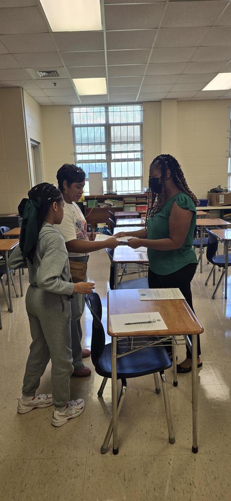 Mrs. Paige grade 5 with parent and student at Meet the Teacher John Will School