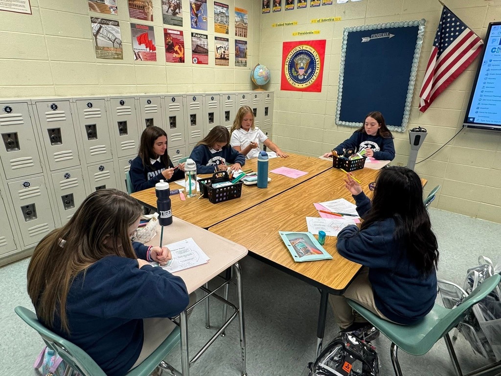 Group of students sitting at a table