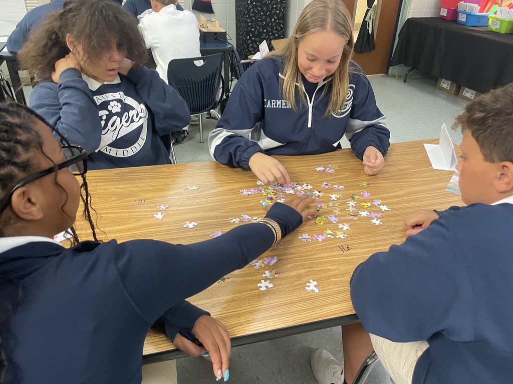 Students working on a puzzle