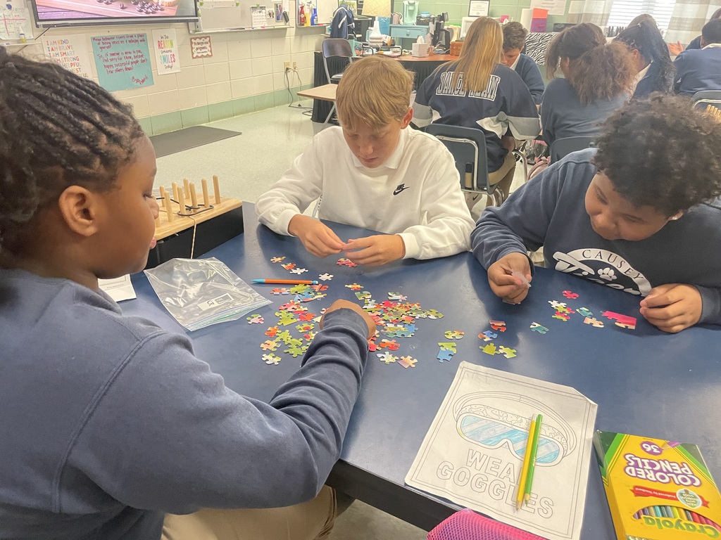 Students working on a puzzle