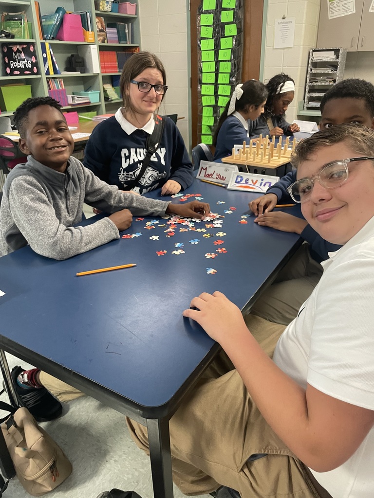 Students working on a puzzle