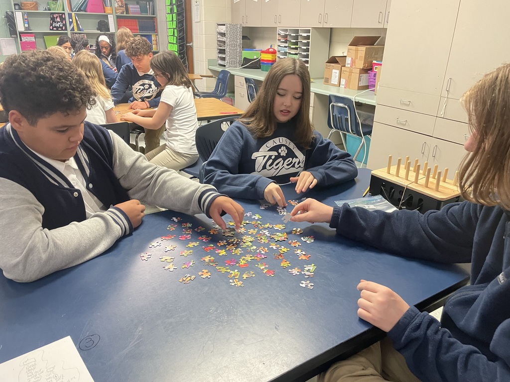 Students working on a puzzle