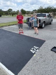 It's a fun Saturday painting Senior parking spots!