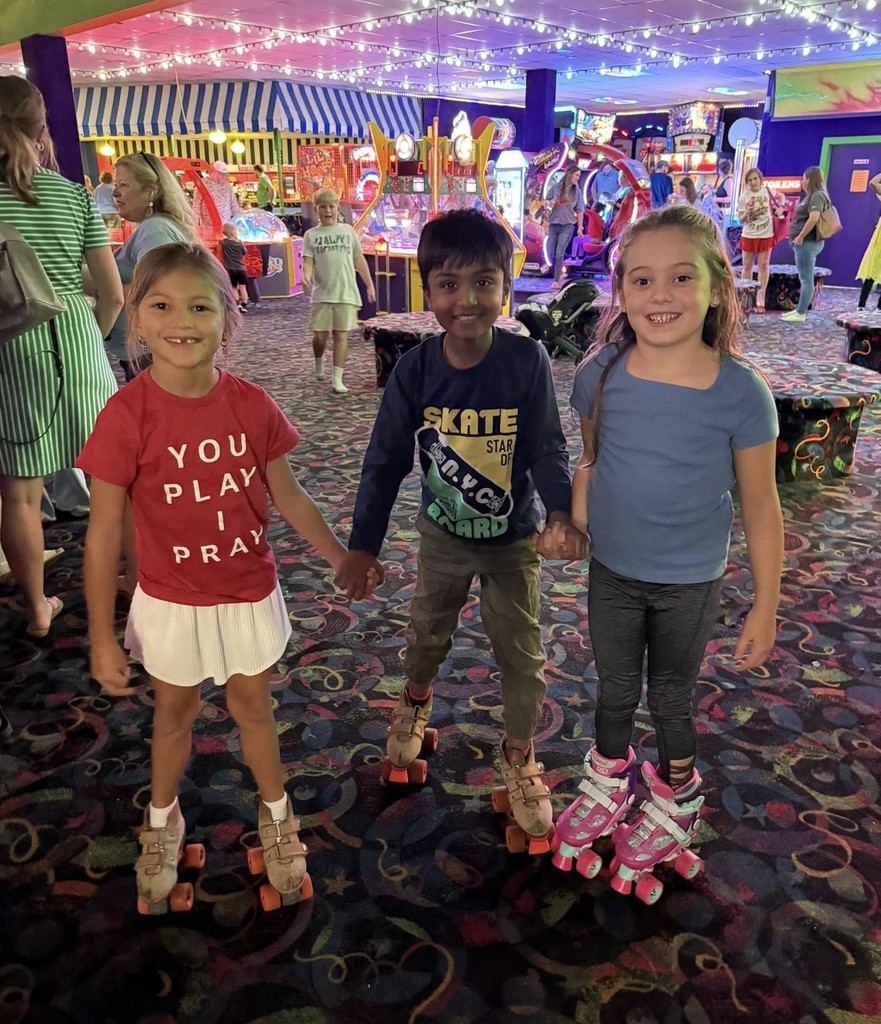 Three students in roller skates