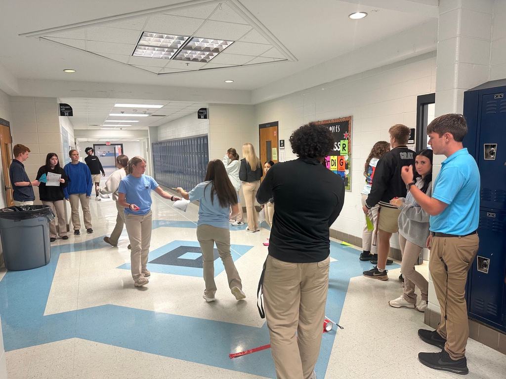 Students participating in a Paper Air Plane Lab.
