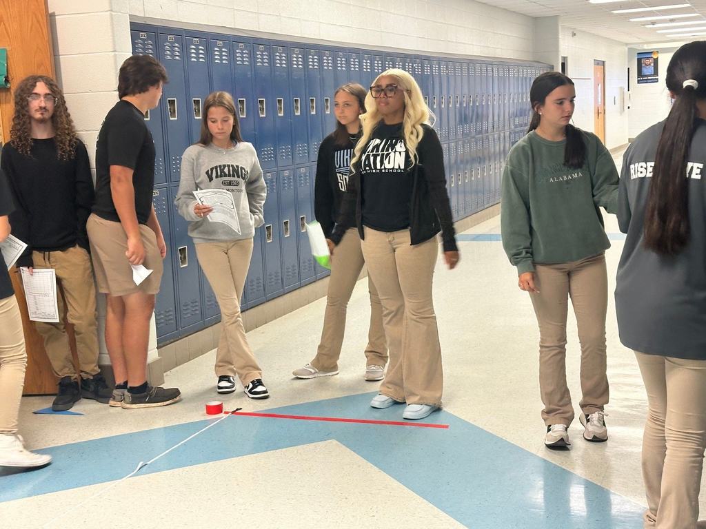 Students participating in a Paper Air Plane Lab.