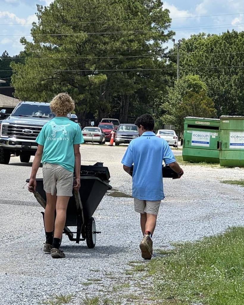 Students with wheelbarrow