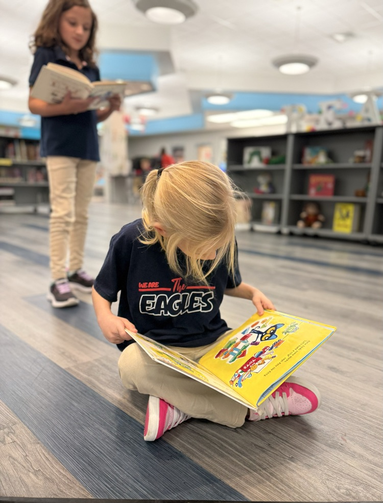 little girls reading books