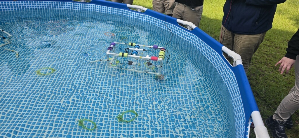 Watching the underwater robot. 